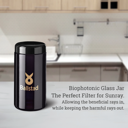 Black glass jar with Ballstad logo on a kitchen counter